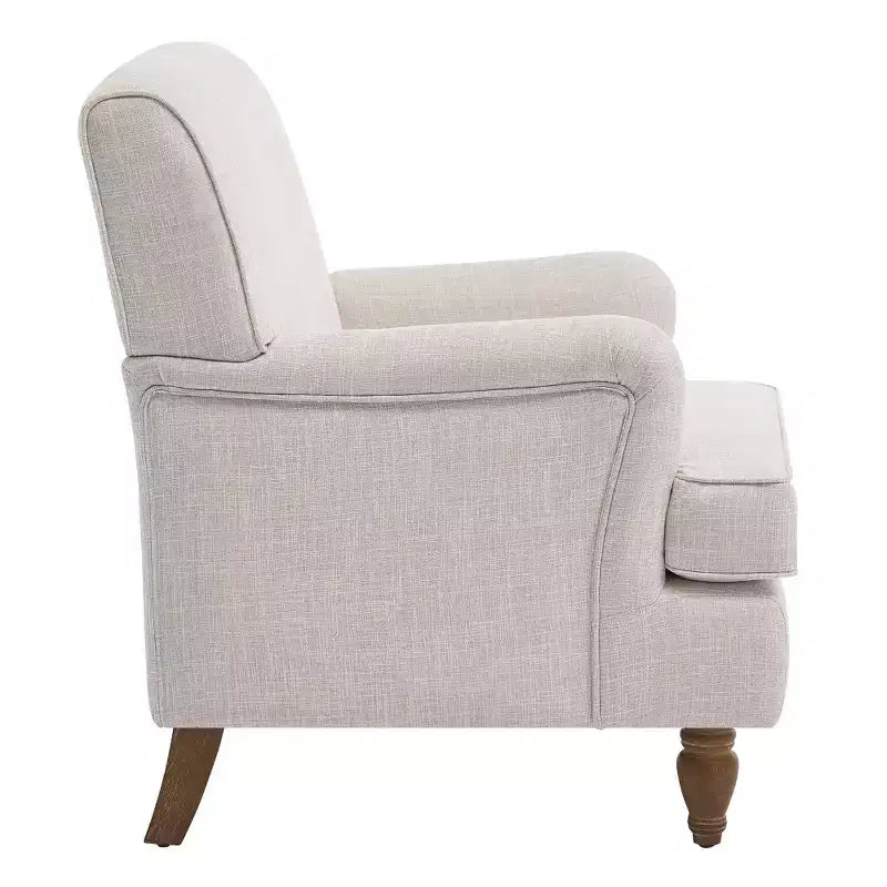Fauteuil vintage en lin avec accoudoirs tapissés et pieds en bois massif ancien